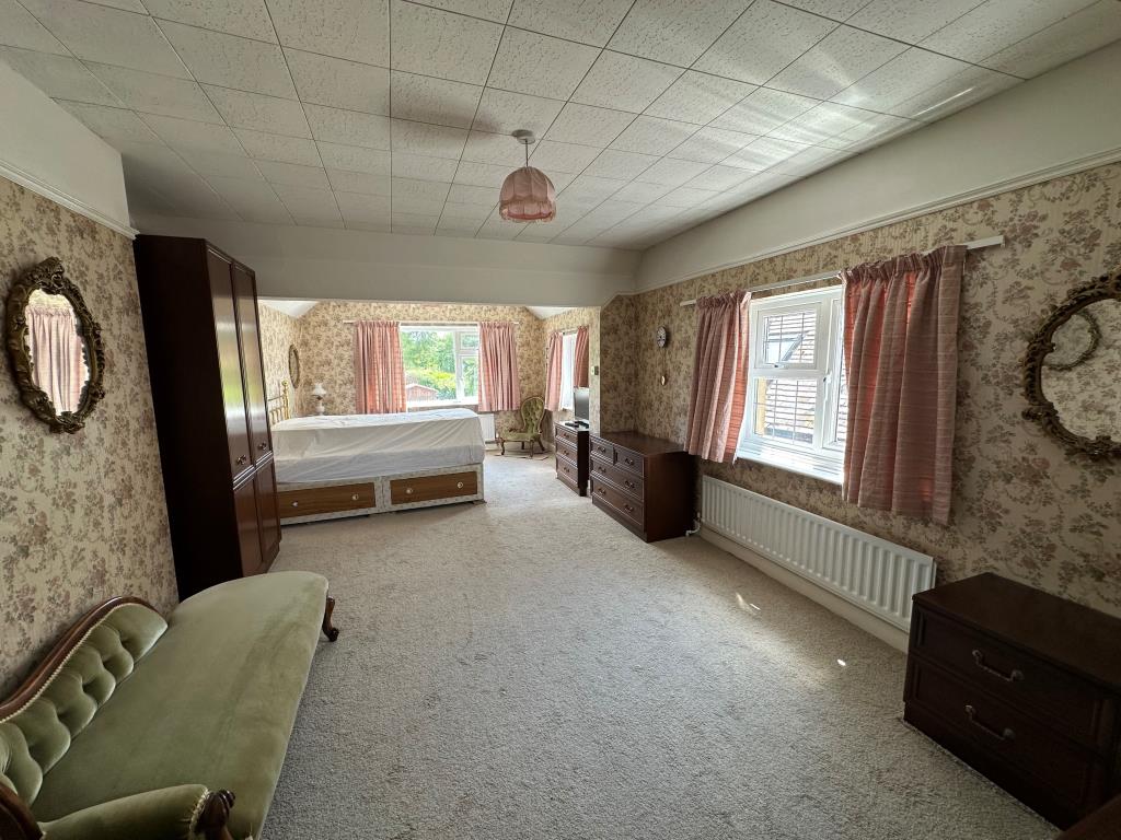 Lot: 63 - DETACHED HOUSE FOR REPAIR WITH POTENTIAL - Bedroom two with dual aspect windows